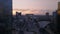 Forwards fly above modern urban borough. Skyscrapers in La Defense business and financial hub at dusk. Large square and