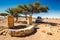 Foum Zguid, Morocco - October 09, 2013. Water well in desert with car under the tree