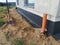 Foundation drainage preparation in construction site