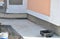 Foundation waterproofing, house wall vapor barrier. House Foundation wall waterproofing construction with concrete path and gutter