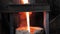 Foundry production. The hot metal from the furnace pours into the ladle