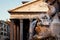 Fountain and the ancient roman Pantheon in Rome at sunset