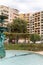 A fountain with apartments behind in Fontvieille Monaco