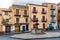 Fountain and apartments on a small piazza in Castelbuomo