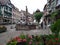 The Fountain in the center of Kaysersberg, surrounded by typical houses in rhenish style.