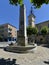 Fountain and church at Sisteron a town in France