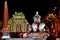 Fountain of Cibeles and AlcalÃ¡ Gate at night.