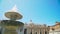 Fountain at the dome of the Basilica of St. Peter. Vatican City. Slow mo camera