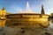 Fountain with ducks in the Plaza de EspaÃ±a in Seville, on a sunny day at sunset, calm and relaxing atmosphere