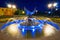 Fountain with fish Sturgeon in the evening illumination . Langepas .