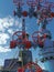 Fountain fittings of a gas well against the background of a drilling rig.