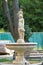 Fountain in front of the Radomanov Institute in Kiev. A raven sits on the head of the statue