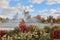 Fountain in the garden of the Parterre with daisies in autumn