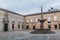 Fountain at Largo do Paco square in Braga with the Rectorate of the university of Minho, Portug