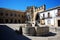 Fountain of the lions in the Plaza de Populo with the Villalar arch and Jaen Arch to the rear, Baeza, Spain.