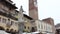 Fountain of Madonna Verona and the  Lamberti Tower in Piazza delle Erbe in Verona