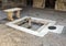 Fountain and mosaic floor in Roman house in Parco Archeologico di Ercolano