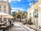 Fountain of Neptune and sidewalk cafe on the Stanislas square in Nancy, France