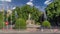 Fountain of Neptune timelapse hyperlapse at the center of the Canovas del Castillo square in Madrid, Spain.