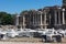 Fountain of Nymphaeus in Side, Turkey. Beautiful ruins of a great structure against the blue sky.