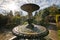 Fountain in ornamental gardens Spetchley park Worcestershire