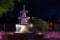 A fountain in a park in Georgetown, South Carolina, USA at night.