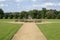 Fountain. pathway. path. garden. park. topiary trees