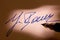 Fountain pen signature on a letter