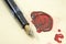 Fountain pen and wax sealed letter