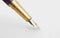 Fountain pen on a white paper with clipping path