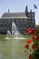 Fountain on a pond in the background of the Binnenhof castle