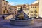 Fountain in a quaint little square in the medieval town of Segovia, Spain.