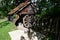 the fountain with the rustic wheel on Sabeului hill 11