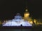 Fountain from the shining fires on the square in front of St. Isaac Cathedral on New Year`s Eve. St. Petersburg. Russia