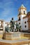 Fountain showing Hercules taming lions with the Socorro Parish church to the rear, Ronda, Spain.