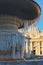 The fountain at St. Peter`s Square covered by ice. A really rare event in Rome. Vatican city. Italy