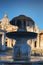 The fountain at St. Peter`s Square covered by ice. A really rare event in Rome. Vatican city. Italy