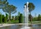 Fountain Three streams turning into complex of fountains Pergola with Italian stone pine tree Pinus pinea pines