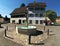 Fountain and traditional building in the Swiss town of Walenstadt