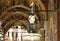 A fountain under the arcades of the Rila monastery.