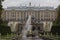 Fountains alley and water canal with the Grand Cascade and Samson Fountain golden sculpture and the palace in the background