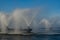 Fountains in a technical reservoir near a thermal power plant.  Industrial tourism.