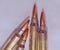 Four .223 caliber rifle bullets