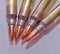 Four .223 caliber rifle bullets