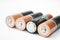 Four AA alkaline batteries on a white background