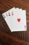 Four Aces - Playing Cards on Wooden