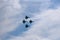 Four aircraft combat fighters a great strong powerful SU-34 military fighters flying in the sky