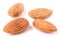 Four almond isolated on white background close-up macro