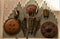 Four ancient shields of different shapes and urines and twenty very pointed spears in a room of Villa Stibbert in Florence.