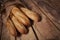 Four baguette bread loaves in paper bag